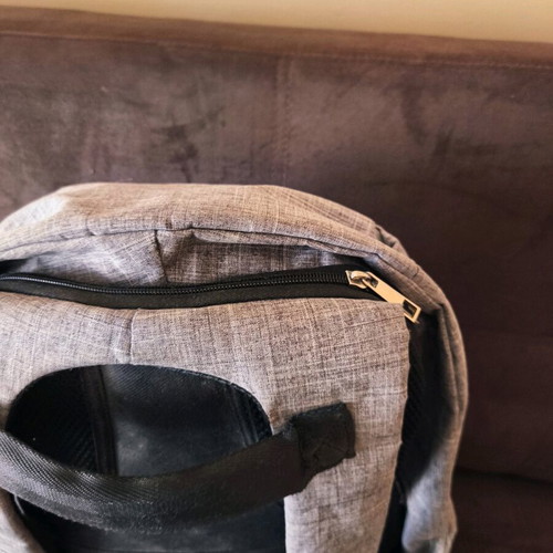 NOD anti-theft backpack used, gray with laptop compartment and USB