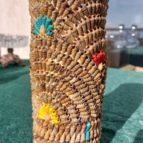 Decorative vase used, adorned with shells, handcrafted