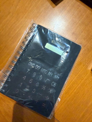 Spiral notebook with built-in calculator new