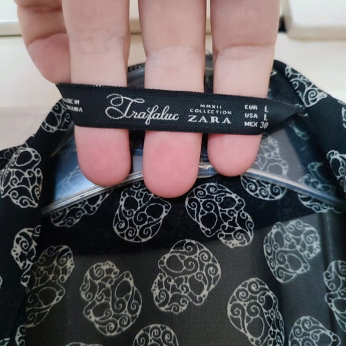 Zara Trafaluc women's shirt large black like new with skull design and gold chain