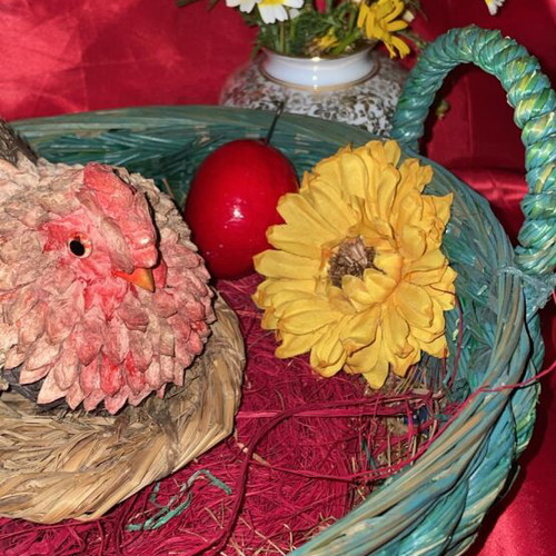 Woven Easter basket like new with hen and 3 red eggs