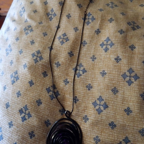 Pendant with long chain used, purple and mirror detail