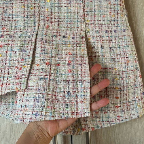 Mini tweed skirt with cutouts like new, XS
