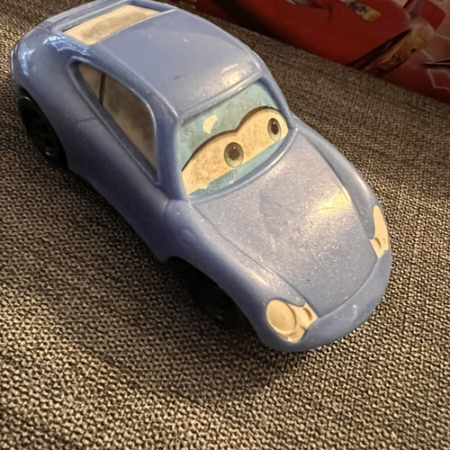 Mattel Disney Pixar Cars Sally 10cm toy car preowned with turning mechanism