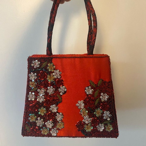 Handbag with embroidery and sequins