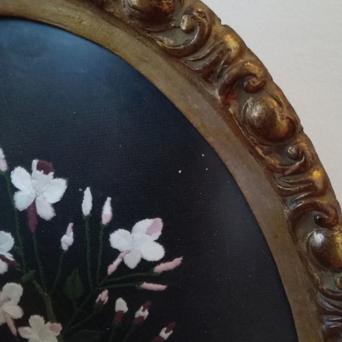 Embroidery in wooden carved frame handmade of exceptional quality