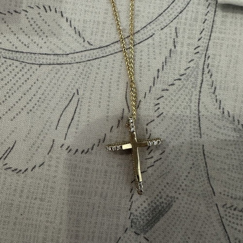 14k gold cross pendant with 9k long chain, reversible design