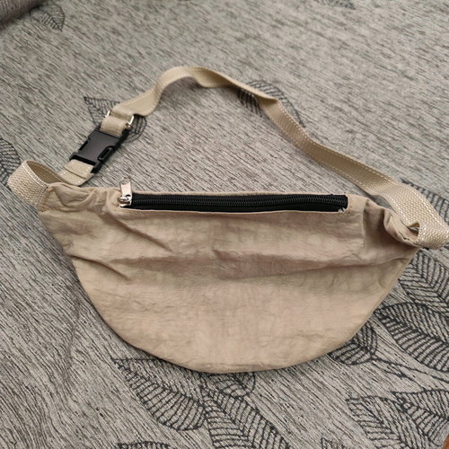 Beige waist bag like new with 3 compartments