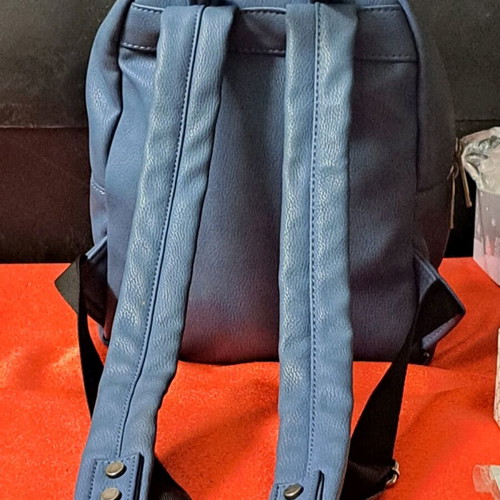Women's blue backpack like new with studded design