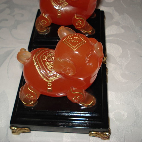 Vintage Feng Shui amber honey Murano-style pig figurines pair