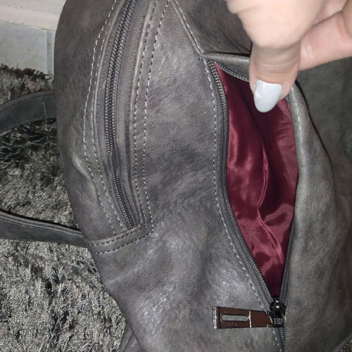 Backpack bag like new with two front hidden pockets gray
