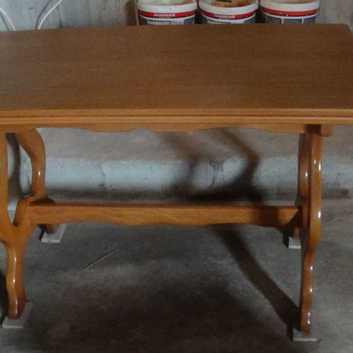 Wooden dining table used with extension