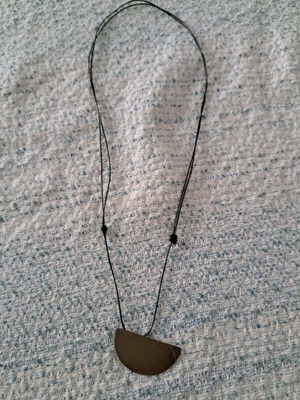 Crescent moon and pirate pendant necklace