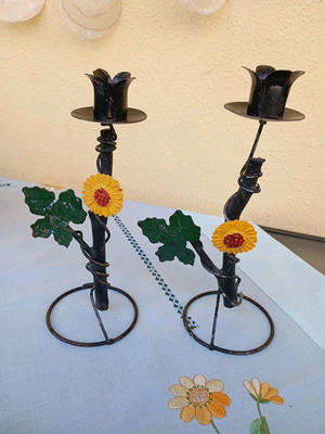 Set of 2 used metal and wood candlesticks with flower design