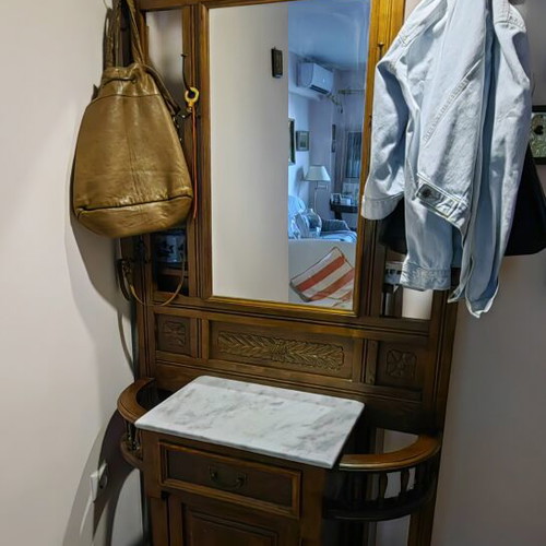 Antique solid walnut entryway furniture with carving, mirror and marble
