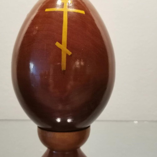 Russian egg used with hand-painted decoration and wooden base