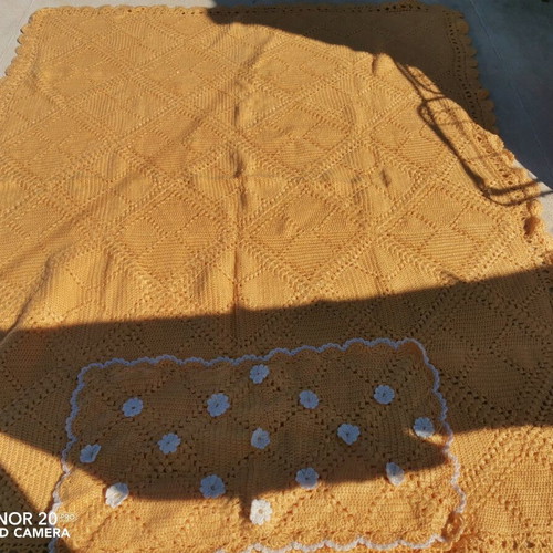 Handmade knitted blanket and pillowcase used