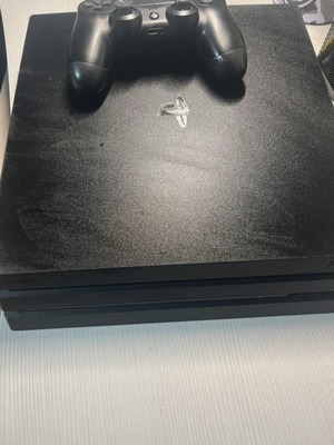 Sony PlayStation 4 Pro used with one controller 1TB
