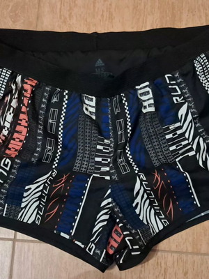 Adidas women's shorts like new, size medium, breathable fabric