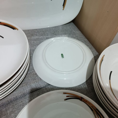 Porcelain dinnerware set with 6 dinner, 6 soup, 6 fruit plates and large serving platter