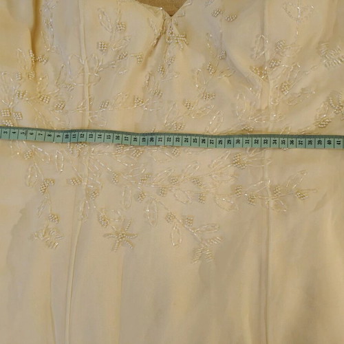 Maxi dress in butter yellow color with straps and embroidery
