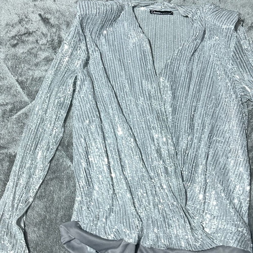 Donna silver sequin bodysuit like new size Large