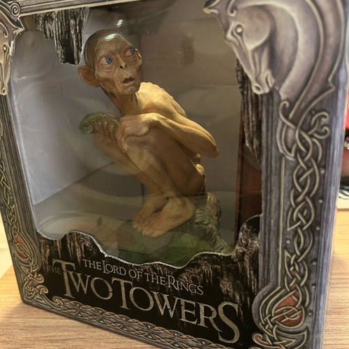 The Lord of the Rings figure and The Two Towers DVD like new