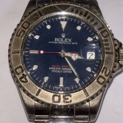 Men's automatic watch with embossed bezel, blue and silver