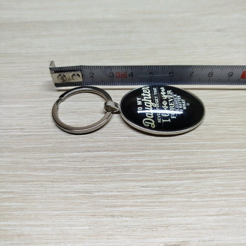 Keychain To my daughter new, black, brass with enamel protection