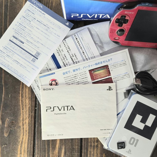 Sony PlayStation Vita PCH-1000 Cosmic Red console