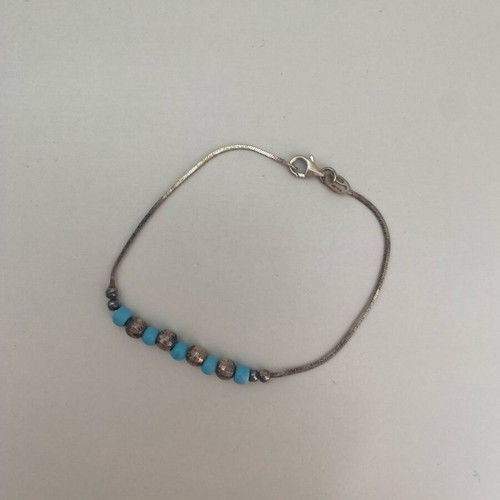 Silver 925 bracelet used with baby blue beads