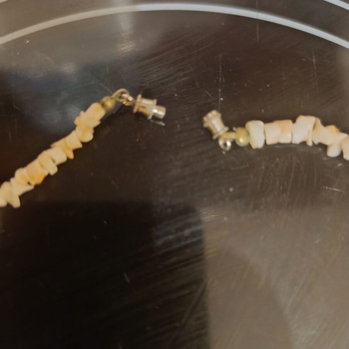 Pooka shell necklace vintage, like new, natural shell fragments light shade