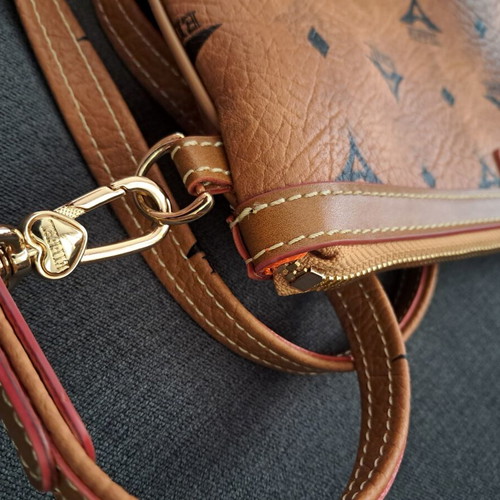 La Tour Eiffel crossbody bag like new, brown with gold details