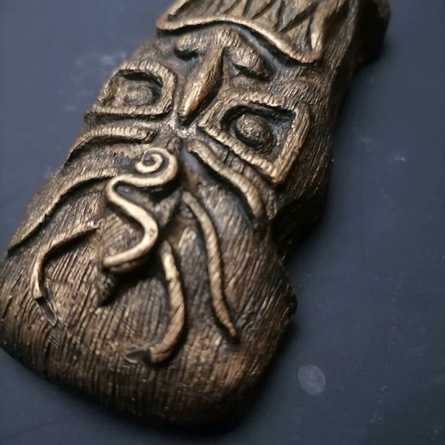 Handmade gypsum magnets and hanging totems painted with acrylics