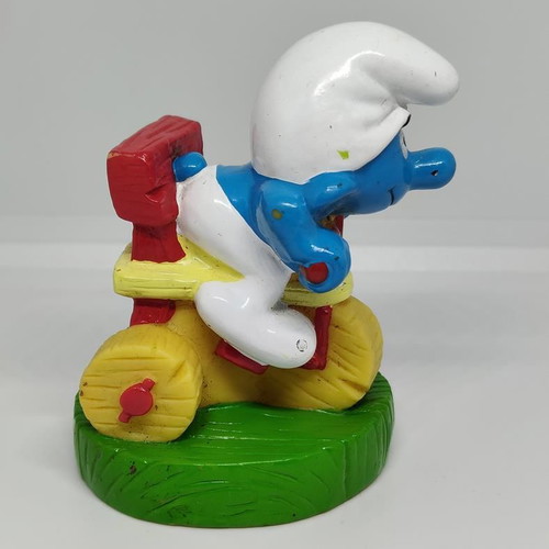 Smurf collectible figure on bicycle handmade Peyo like new