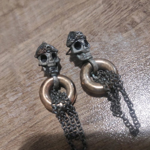 Earrings used with skull design