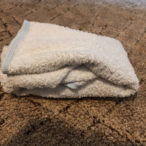 Baby bathrobe like new, white with blue details and belt