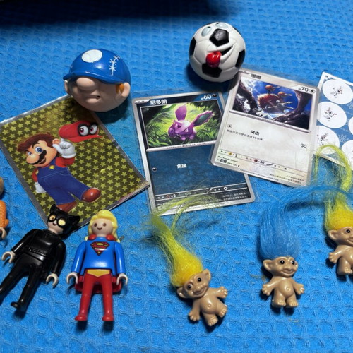 Vintage loot with Pokemon cards and toys, like new