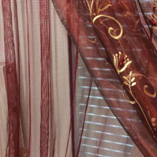 Burgundy curtain like new with gold flowers, double organza and net