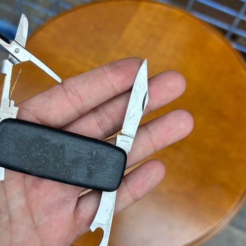 Vintage pocket multitool 4 functions with scissors and opener used