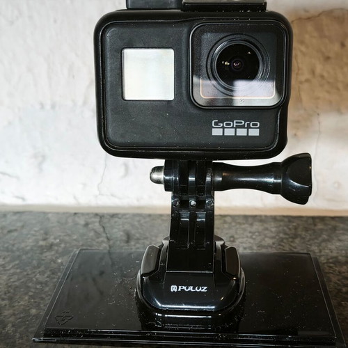 GoPro HERO 7 Black used with extra battery, dual charger, Lowepro case and accessories