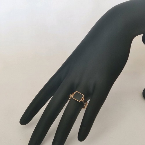 Women's ring like new, gold color with large black decorative stone