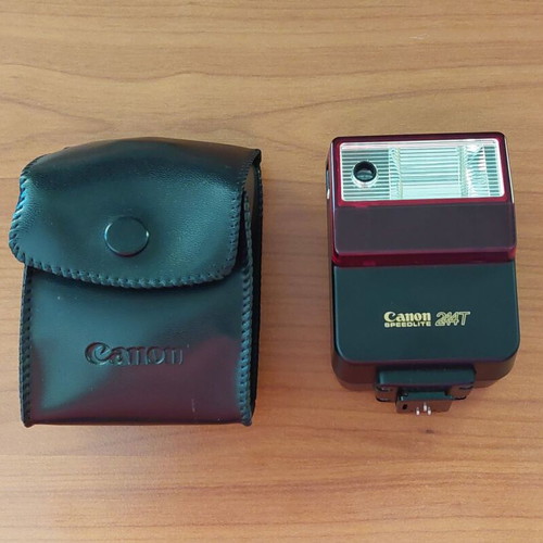 Canon T70 film camera with 2 lenses, flash and case like new