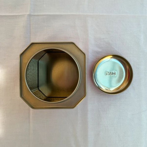 Metal tea tin used from Marks & Spencer