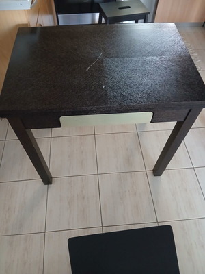 Extendable kitchen table used, black with silver drawer