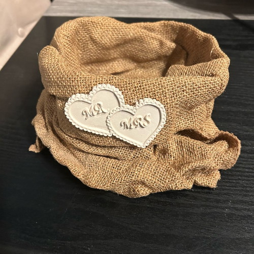 Hard pouch made of burlap with ceramic decoration like new