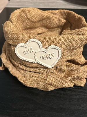 Hard pouch made of burlap with ceramic decoration like new