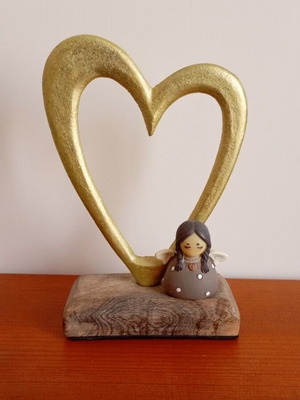 Decorative heart-shaped ornament with angel like new