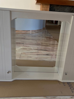 Mirror with storage space used