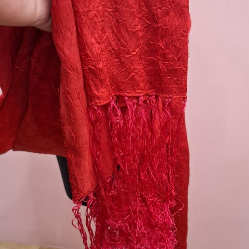 Red scarf with fringes like new